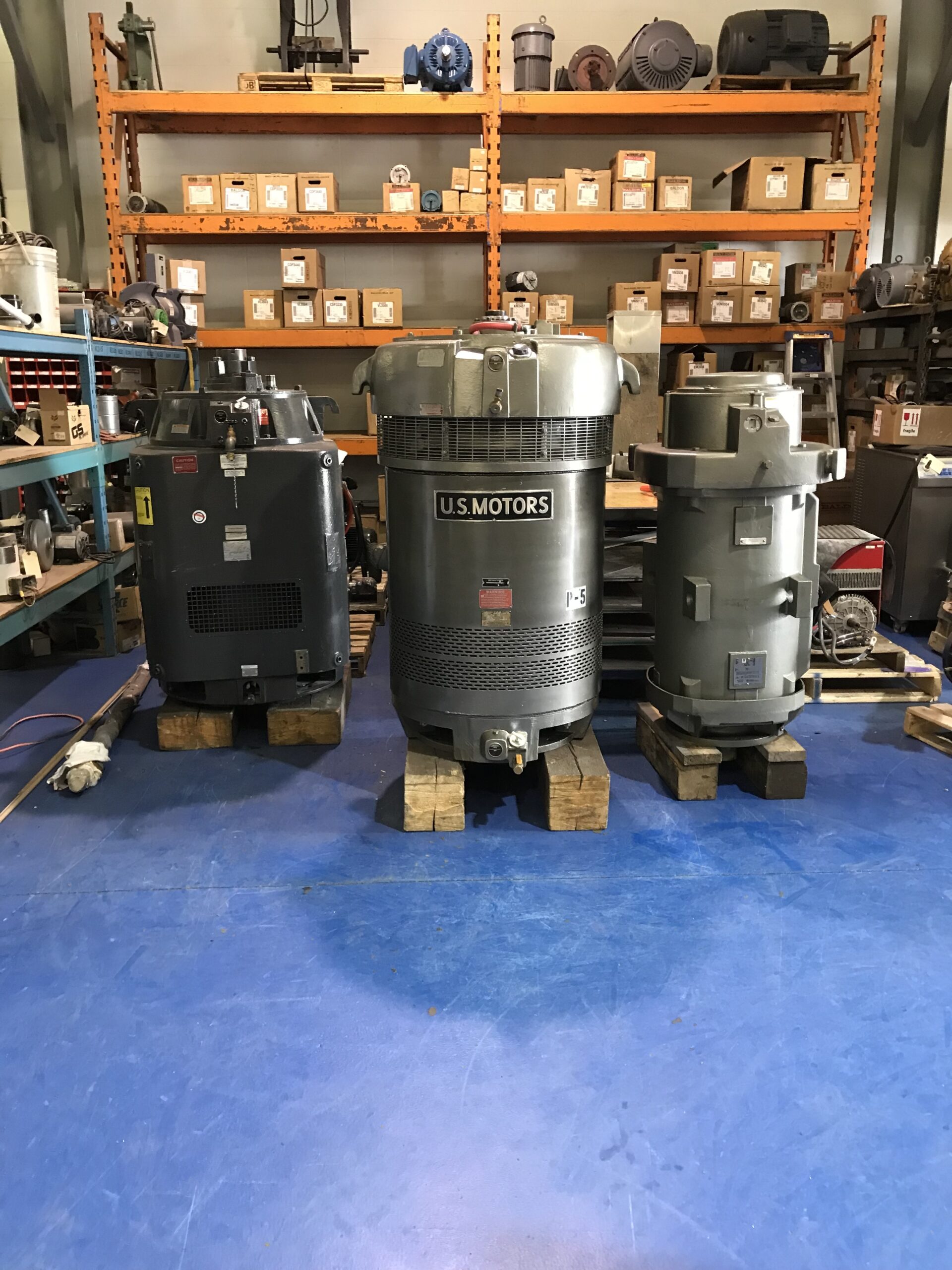 Motor being repaired on workbench at Complete Electric Calgary shop